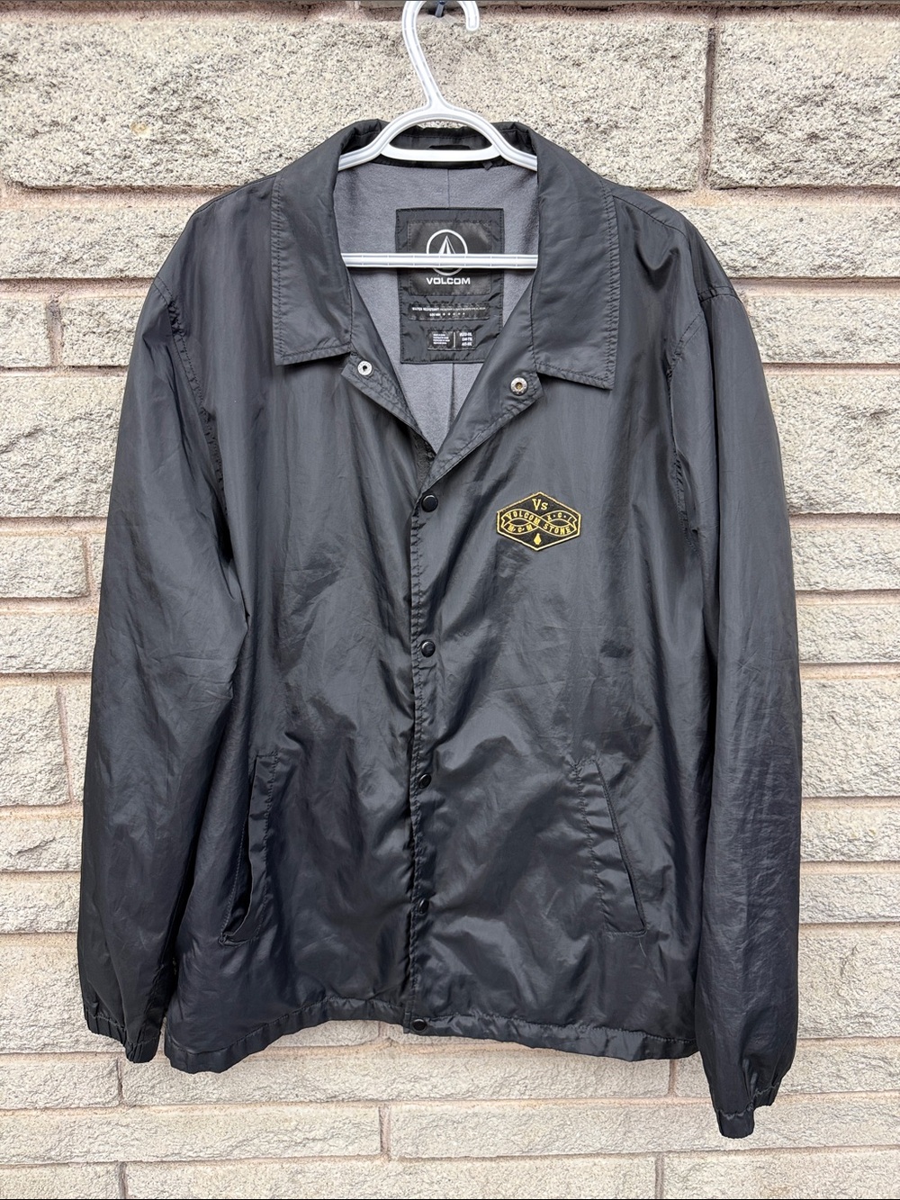Volcom Black Windbreaker Jacket with Yellow Patch